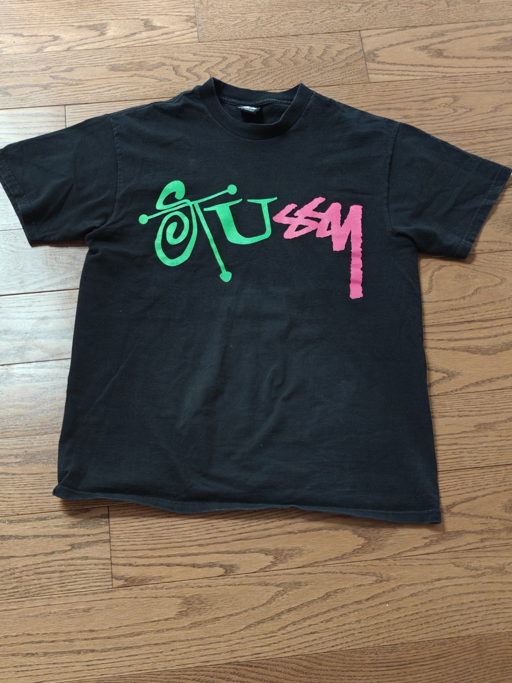 Stussy Black Tee with Orange & Teal Logo